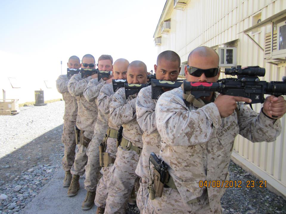 Marine's with mustaches on guns